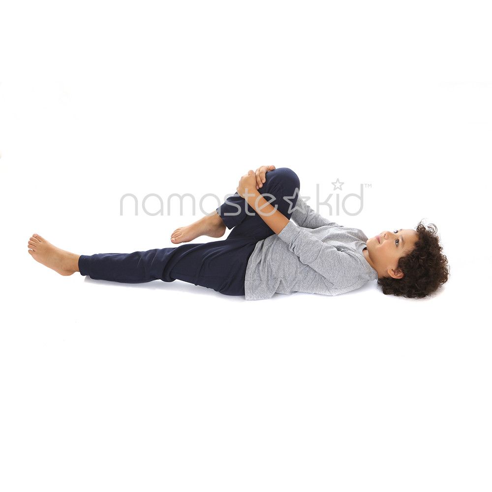 Man Doing Yoga on the Floor Practicing Variation of Wind Relieving Pose,  Sports Stock Footage ft. Yoga & Back - Envato Elements