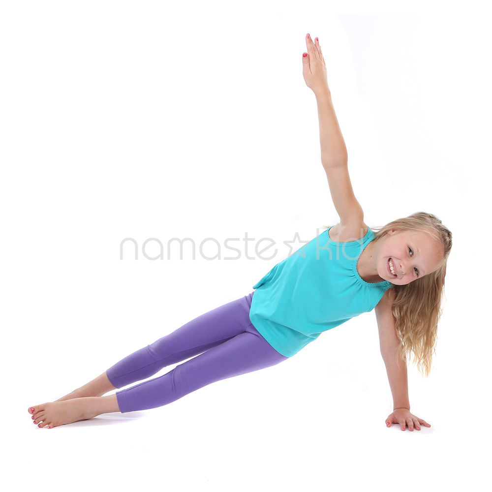 five young people practicing yoga in plank pose Stock Photo by  LightFieldStudios