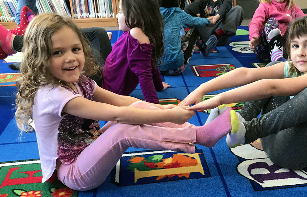 Preschoolers using Yoga in Classroom